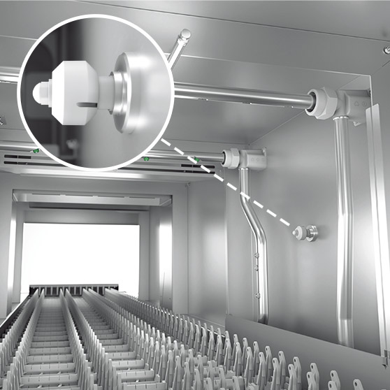 Interior view of a HOBART conveyor dishwasher focusing on spray arm and nozzle