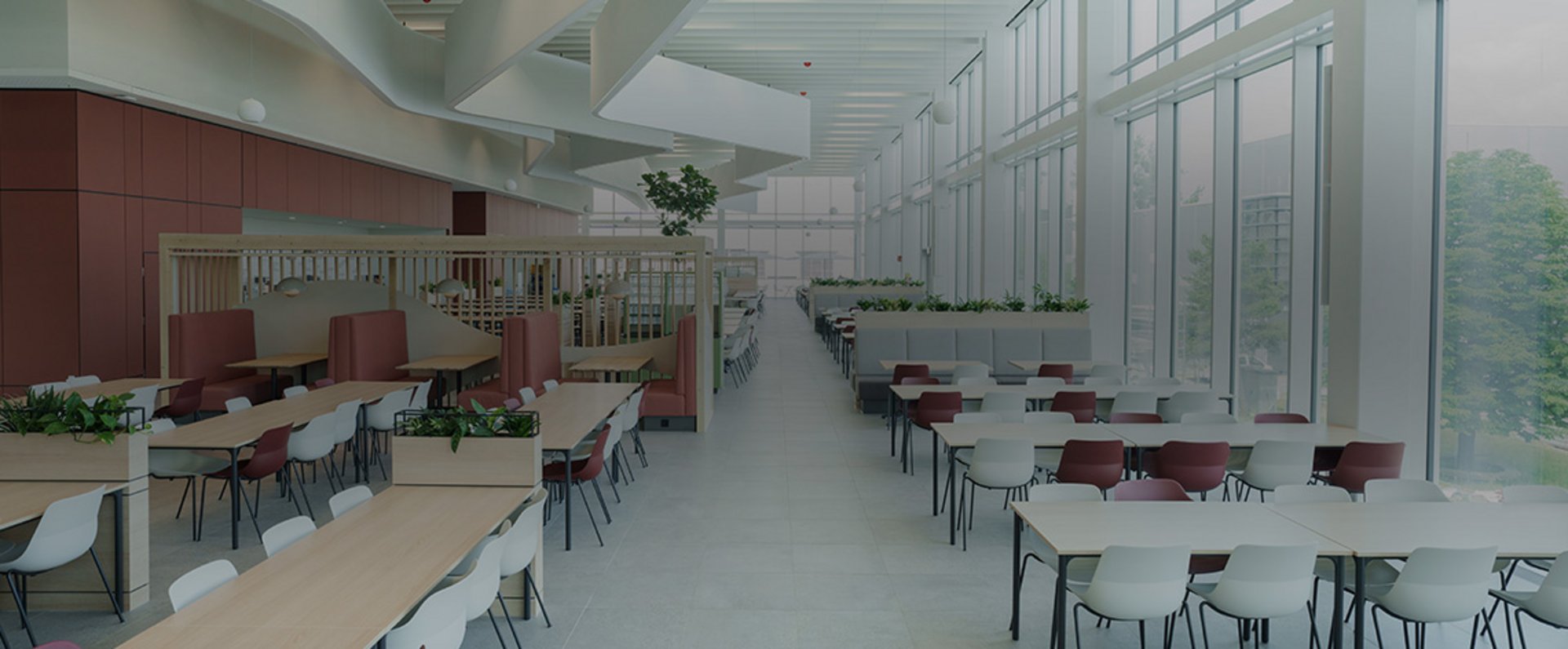 Bright and spacious dining area of the MTU Aero Engines company restaurant featuring modern furniture, natural light, and open seating zones designed for both meals and informal meetings.